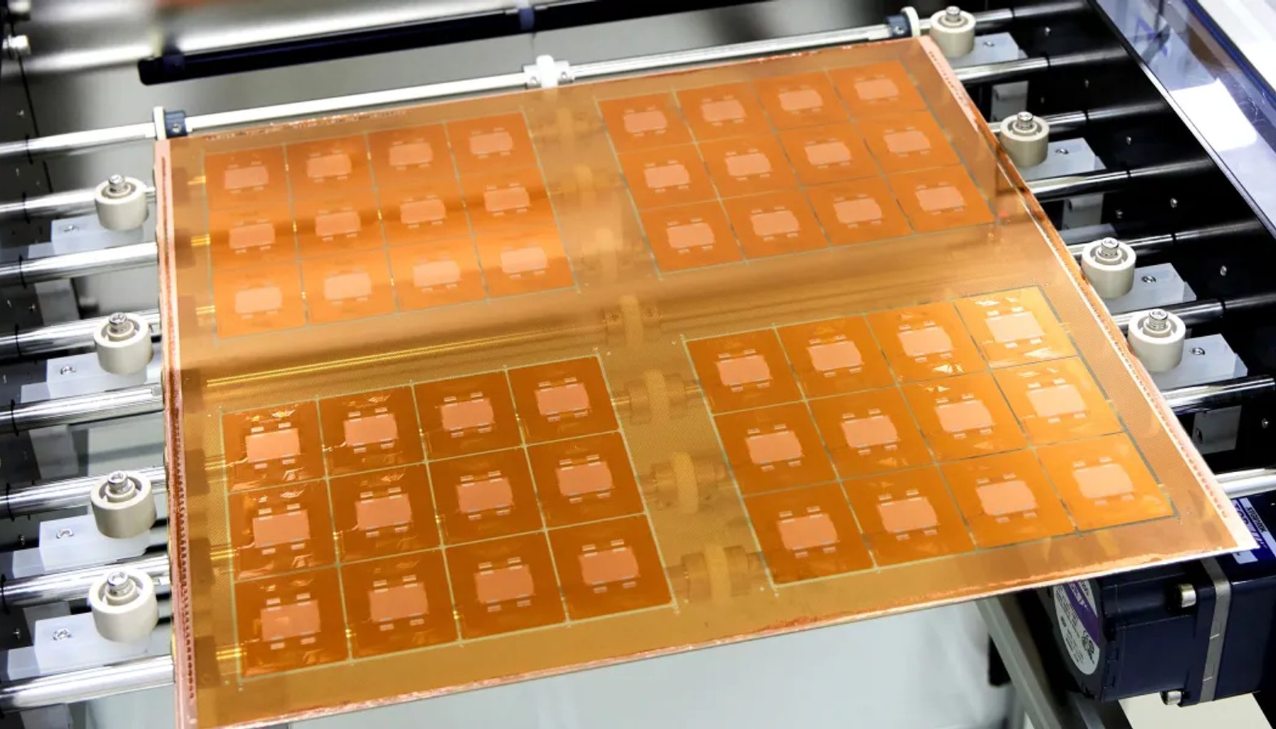 The Download: glass chips and “AI-free” logos