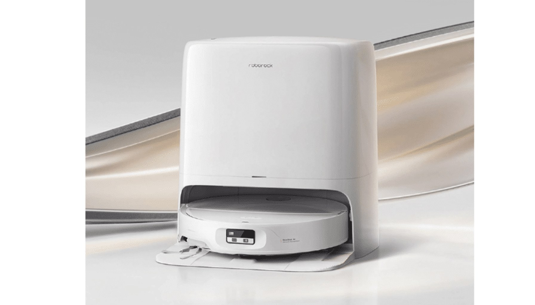 White Roborock Qrevo Edge 3 Pro robot vacuum and mop positioned in front of its multifunctional dock.