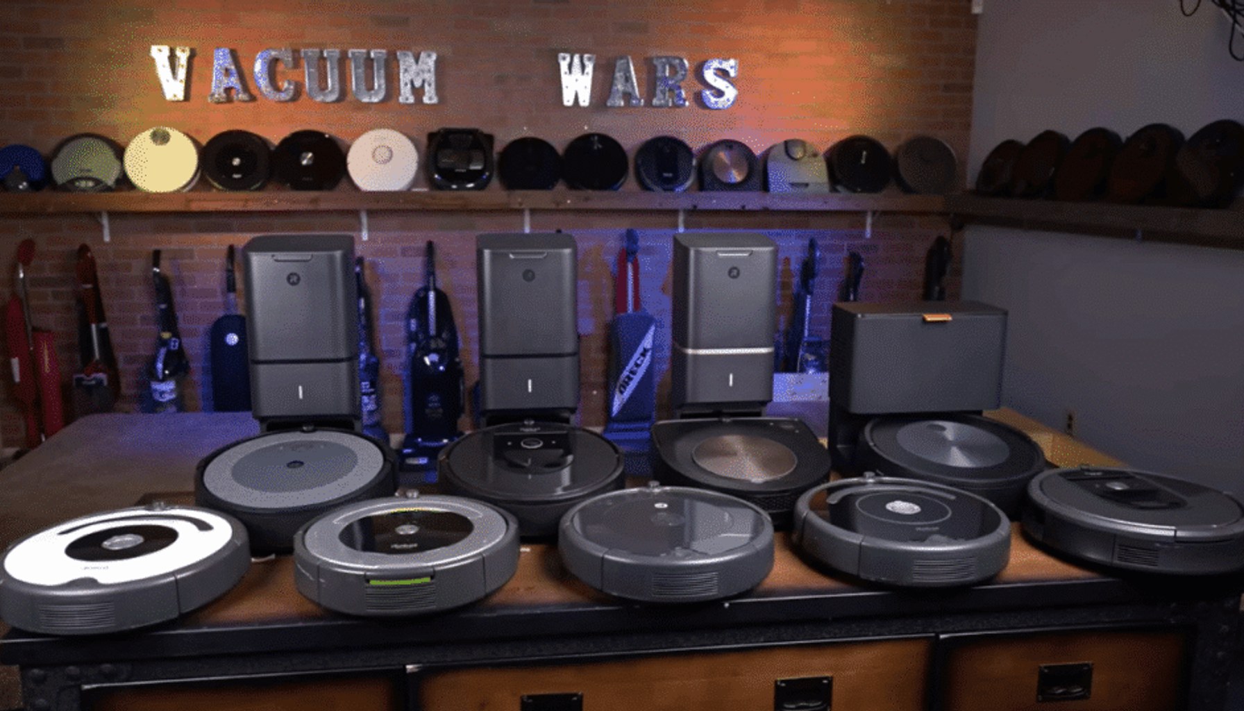 Vacuum Wars' robot vacuum test lab displays models from major manufacturers whose products have historically relied on Asian manufacturing.