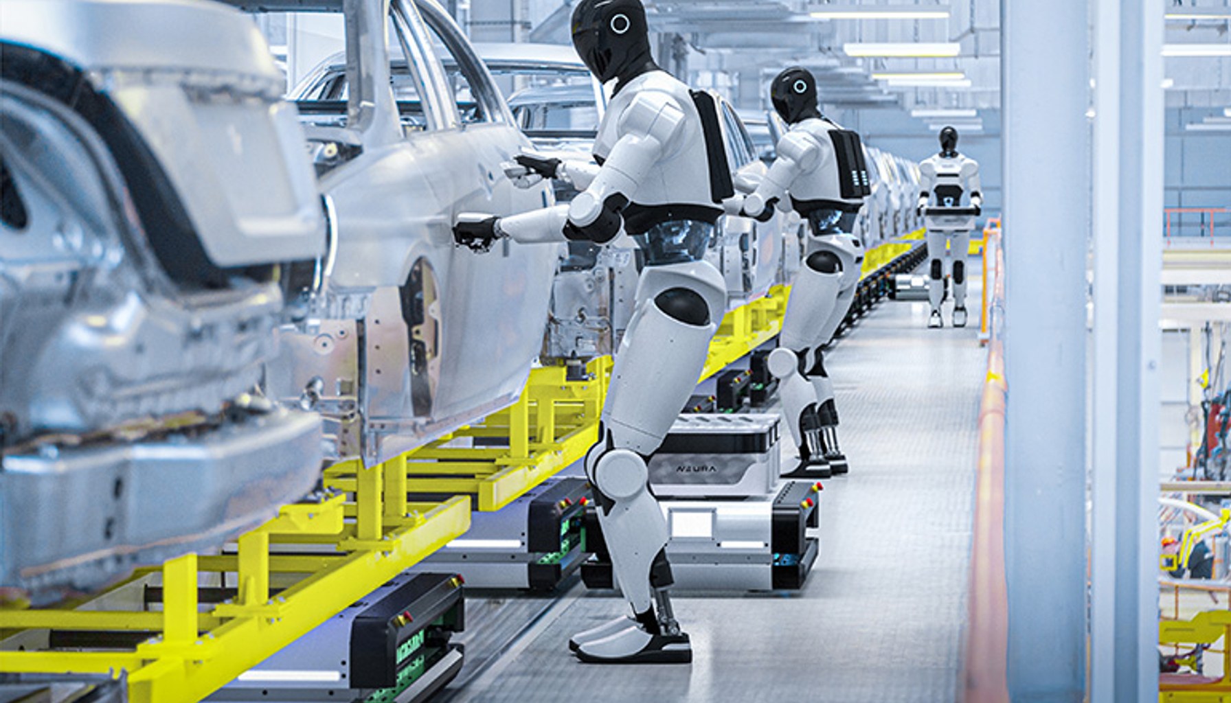 NEURA Robotics' 4NE1 humanoid robot and MAV mobile robots in a concept automotive assembly line.